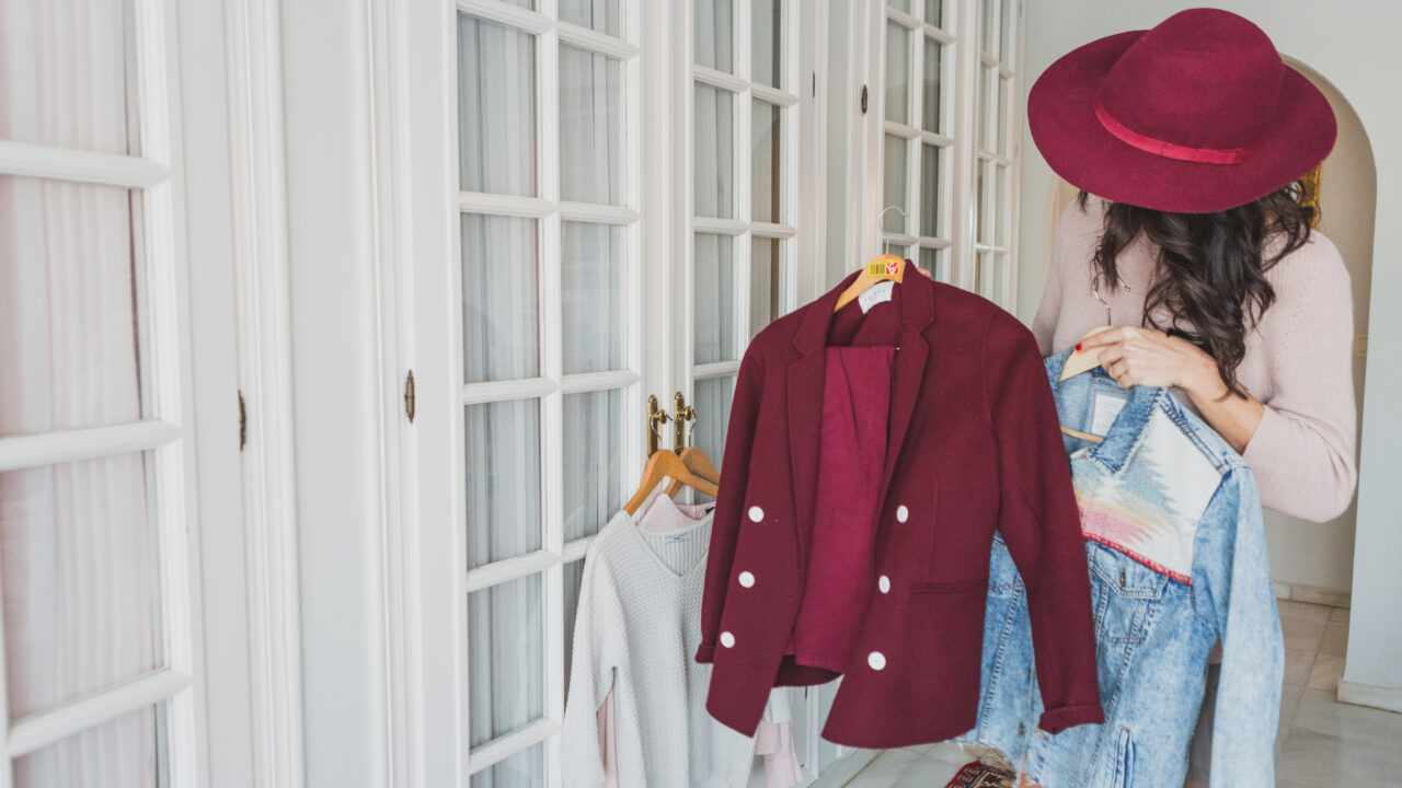 stylish-young-woman-looking-burgundy-suit